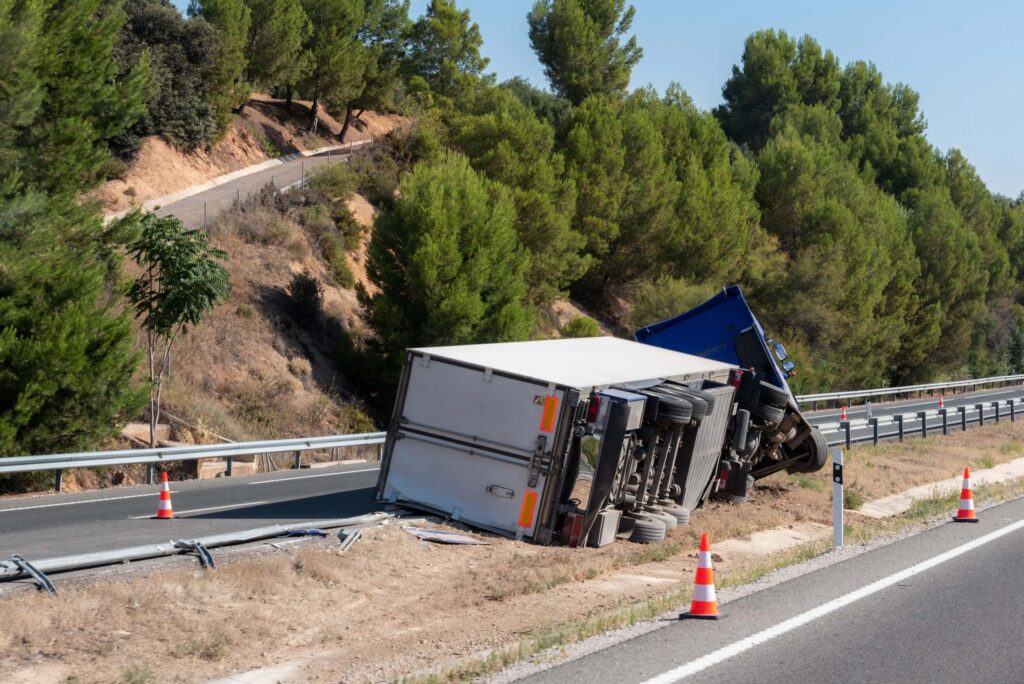 Truck accident, overturned at the highway Truck accident, overturned at the highway